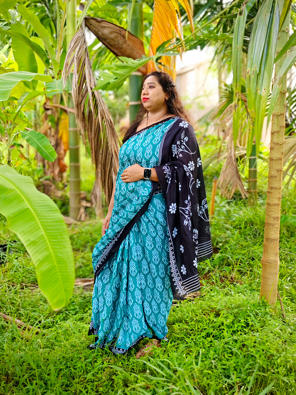 Teal Blue Printed Cotton Mulmul Saree with Black Contrast Border