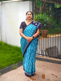 Teal Blue Printed Cotton Mulmul Saree with Black Contrast Border